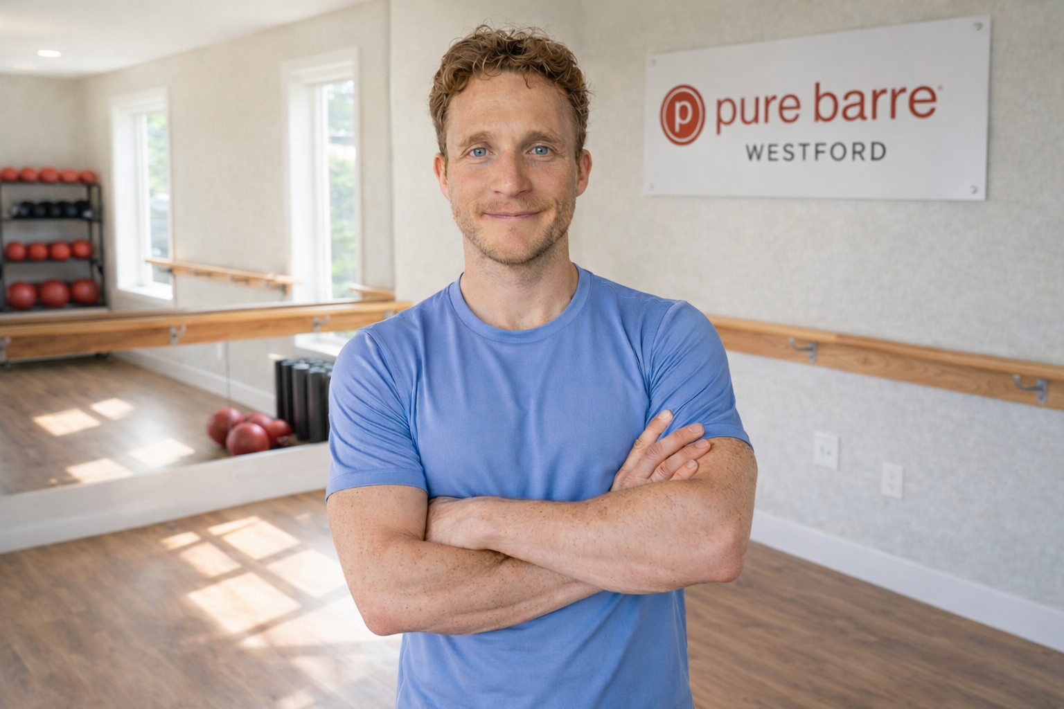 Nate standing in the Pure Barre Westford studio